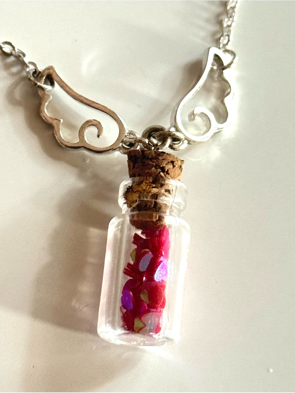 Justice Silver Angel Wing Necklace with Glass Bottle Pendant and Pink Hearts